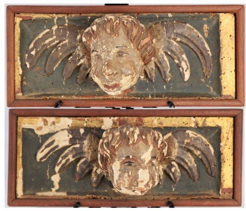 Pair of carved wood cherubs heads, Italian, 18thc.