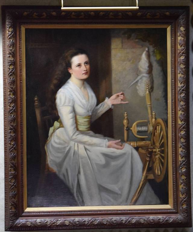 Young Woman Spinning Wool