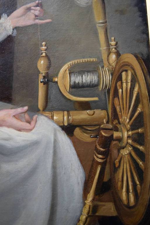 Young Woman Spinning Wool