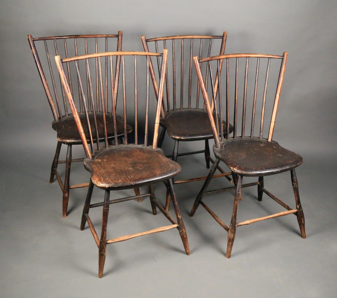 Four Black Painted Primitive Windsor Side Chairs, late 18thc.