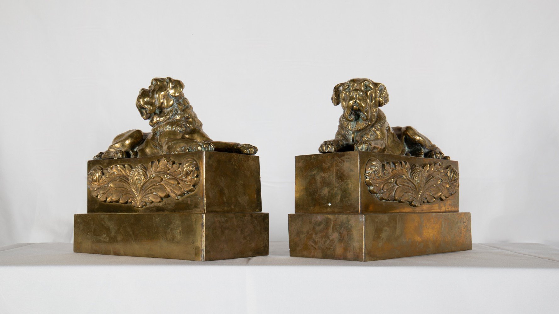 A Pair of Brass Mastiff Chenets