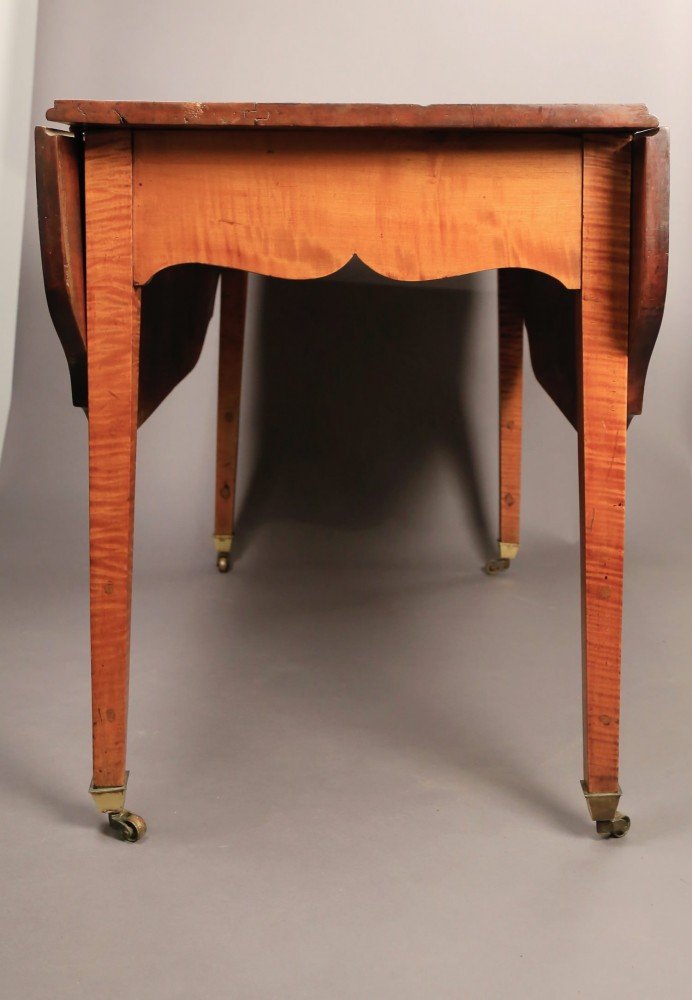 An American Federal or Sheraton Tiger Maple Drop Leaf Table, 19thc.