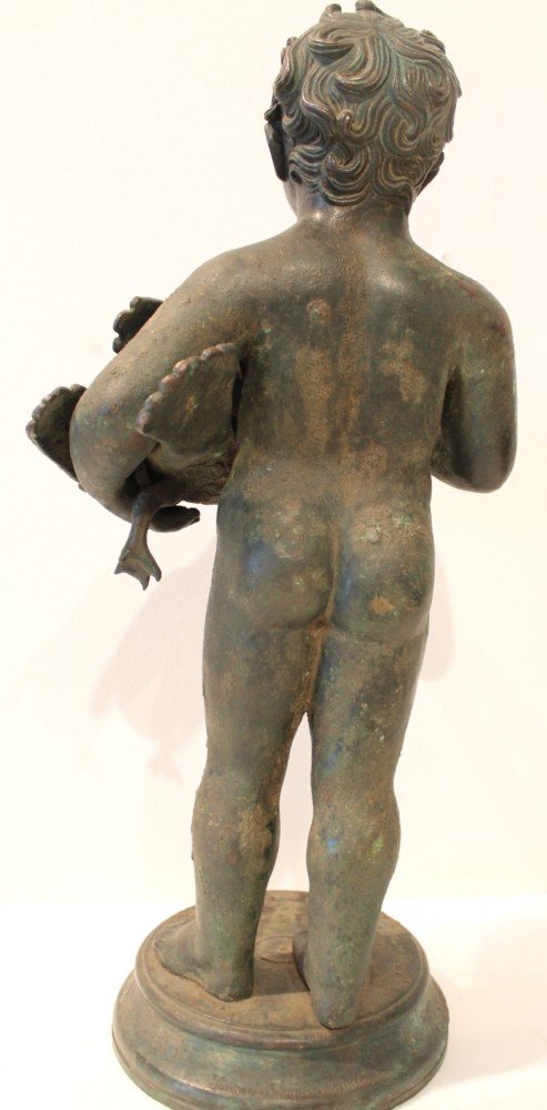 A Grand Tour Bronze of a Boy Holding a Duck and a Bunch of Grapes