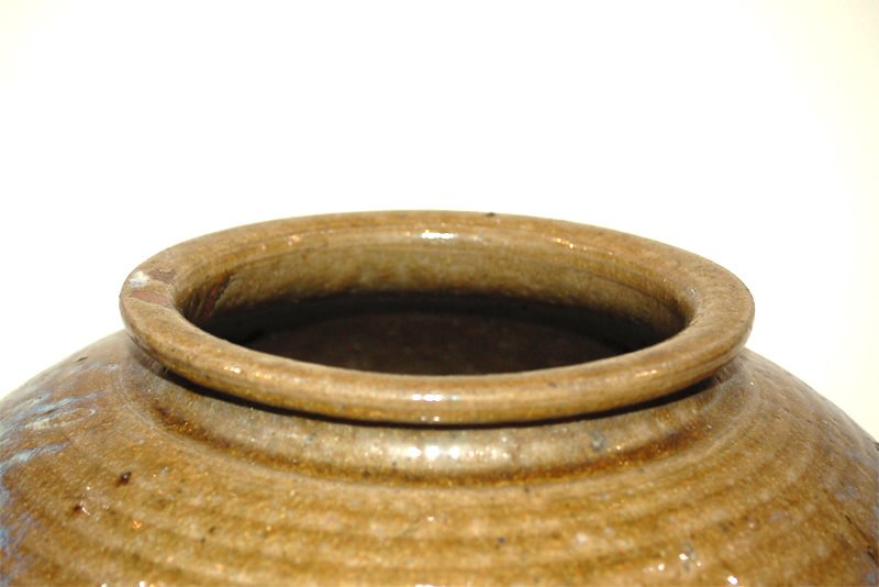 A Japanese Glazed Pot With Spout