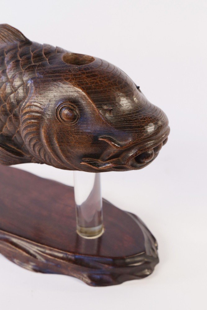 A Japanese Carved Wood Hearth Fish