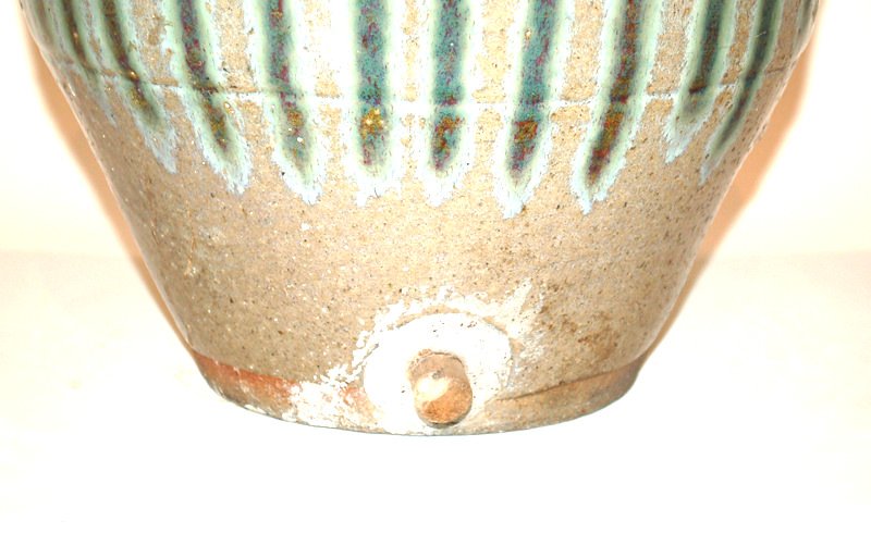 A Japanese Shigaraki Urn With Spout