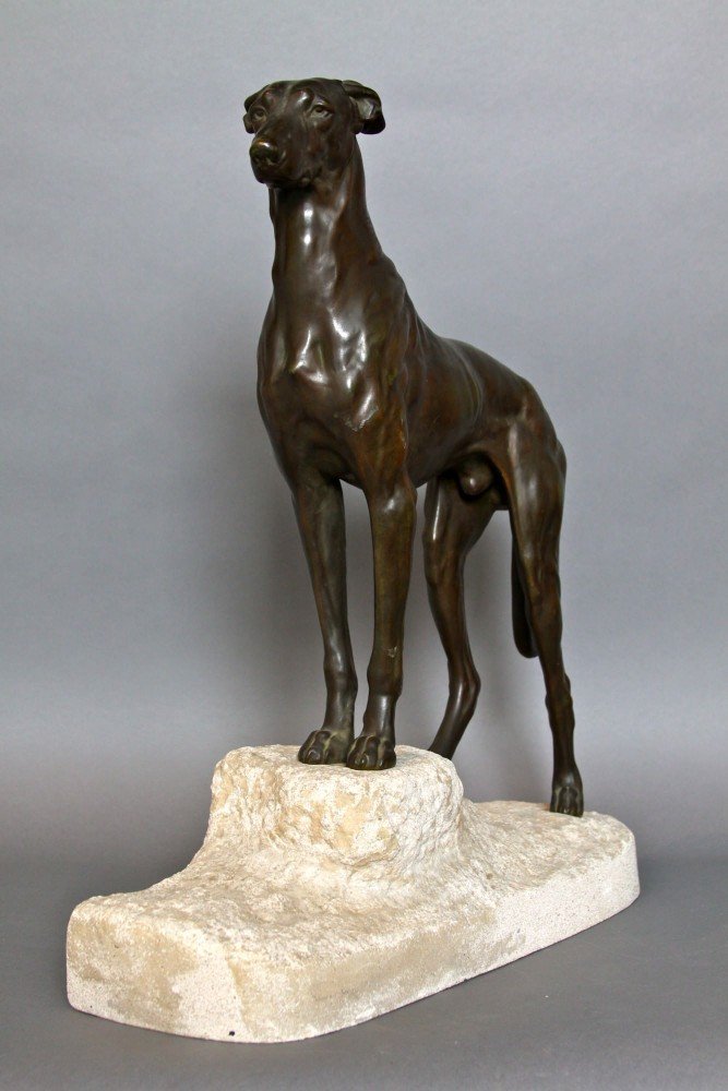 Animal Bronze with brownish green patination, on a fitted stone base Sculpture: 