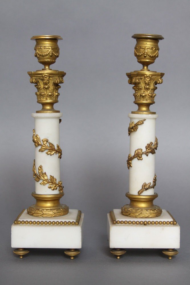 A Pair of French Gilt Bronze and Marble Candlesticks
