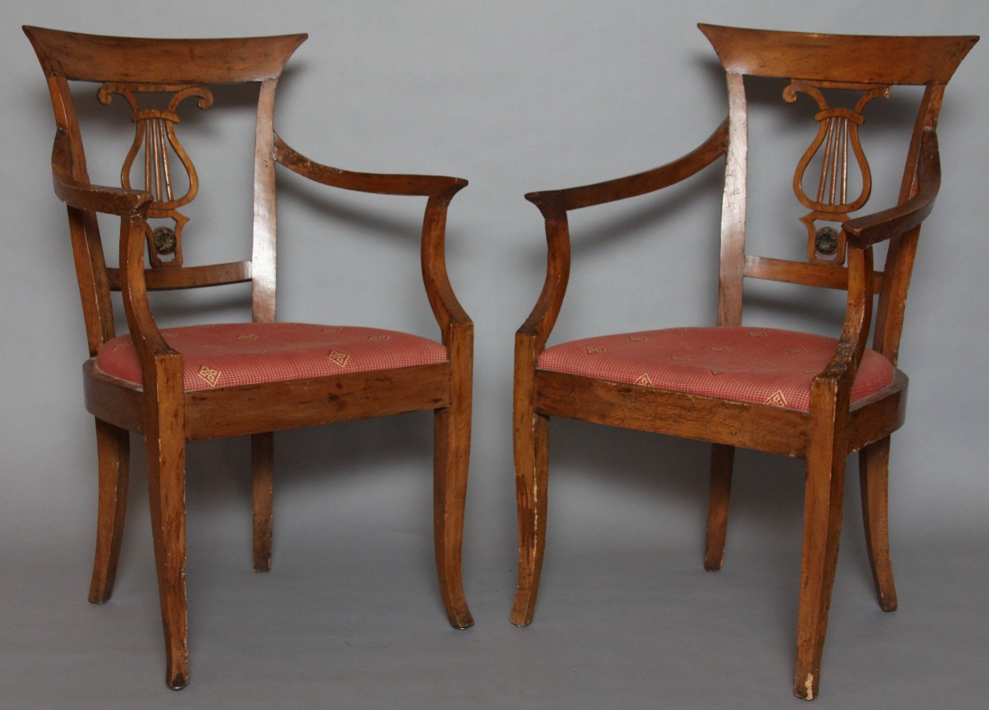 A Pair of Italian Neoclassical Fruitwood Armchairs