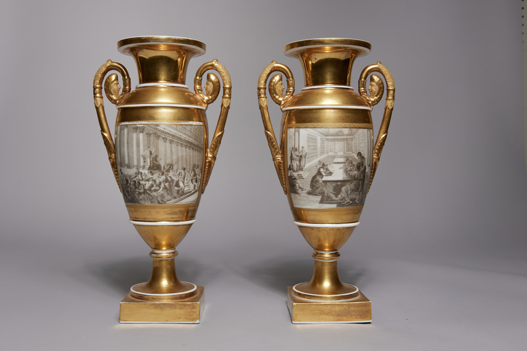 Pair of French Porcelain de Paris Gold Urns with Scenes of Roman History