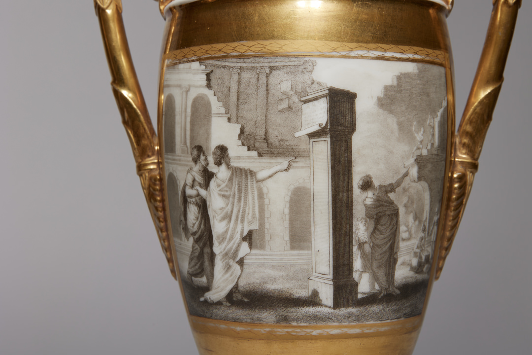 Pair of French Porcelain de Paris Gold Urns with Scenes of Roman History
