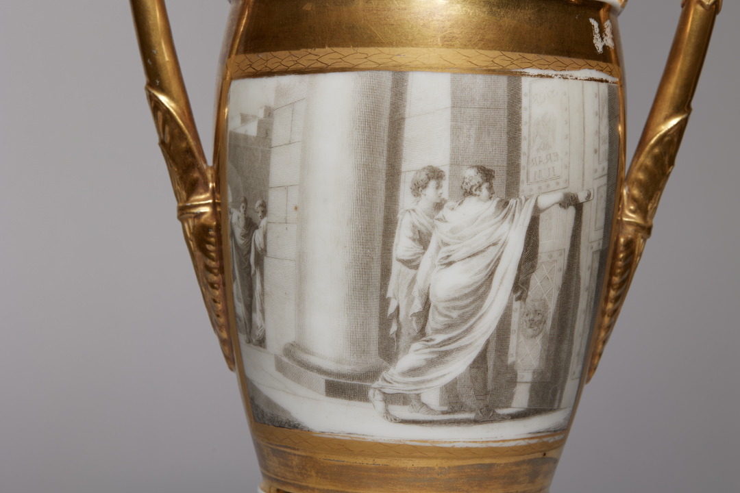 Pair of French Porcelain de Paris Gold Urns with Scenes of Roman History