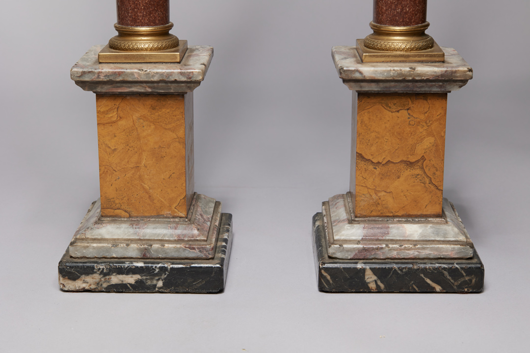Pair of Porphyry Marble Columns with Gilt Bronze Capitals
