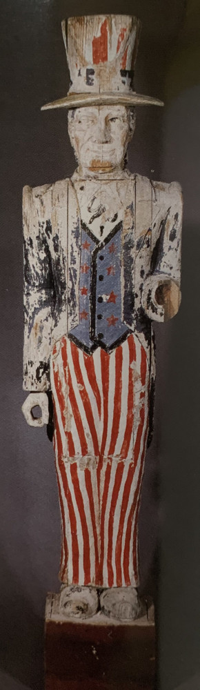 An American Carved and Painted Pine Standing Figure of Uncle Sam