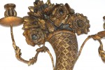 A Pair of Continental Carved and Gilded Wood Two Light Cornucopia Sconces