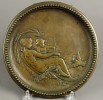 A Cast Brass Plaque depicting Venus and Cupid