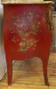 A French Pagoda Red Lacquered Bombe Commode