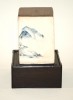 A Japanese Ceramic Water Jar With Landscape