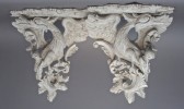 A Pair of Georgian Style Carved and Painted Bird Form Wall Brackets