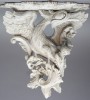 A Pair of Georgian Style Carved and Painted Bird Form Wall Brackets