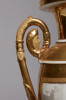 Pair of French Porcelain de Paris Gold Urns with Scenes of Roman History