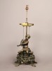 A French Bronze Figure of a Putto, Fitted as a Table Lamp, 19thc.