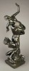 Figurative Bronze with Greenish Brown Patination Sculpture: 